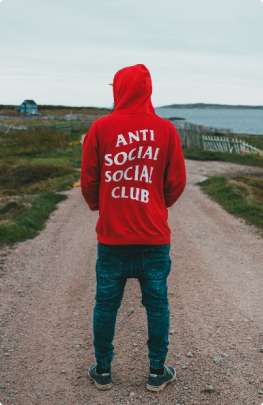 Rufits men looking behind wearing red sweatshirt